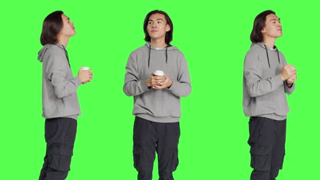 Person-drinking-cup-of-coffee-on-camera